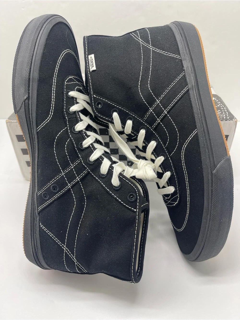 Vans Men’s High-Top Canvas Sneakers in Black and White